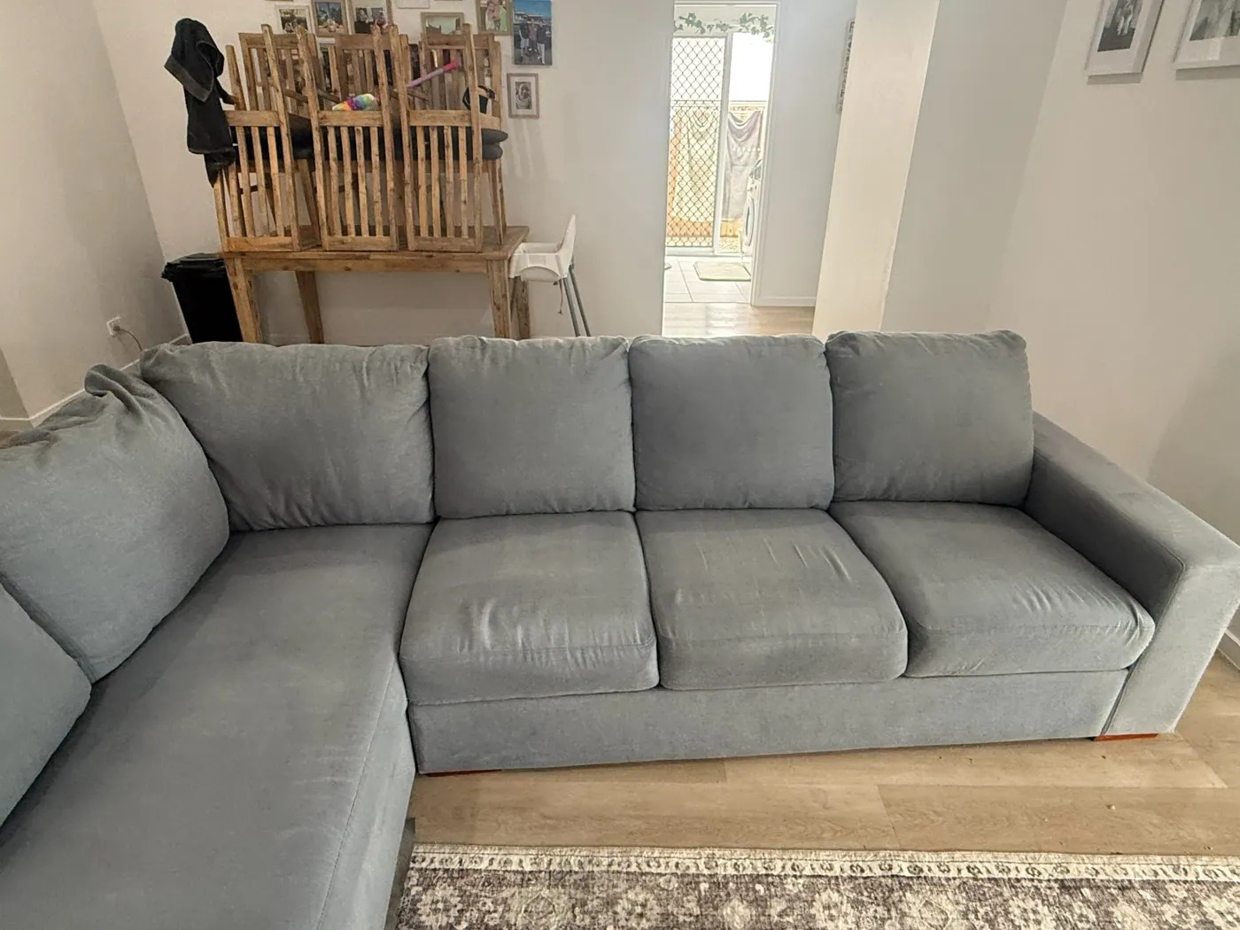 Before and after stained grey couch cushion cleaning result after